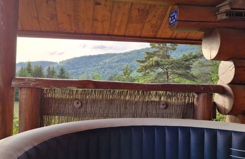 Camprieu Ski Chalet | Traditional log cabin with Jacuzzi and wooded garden in the Cévennes