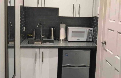 Newtown Apartment | Tranquility Hotel Suite Pent, walking distance to the QPS, Ariapita Ave & EV Zoo