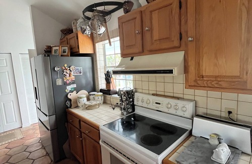 Dinkins Bayou House | TREE HOUSE a charming 2-bedroom home on wonderful Sanibel Island. Beach close.