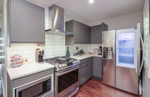Imperial Beach House | Tricked out 1/1 Beach Cottage, Pets, AC, Putting Green, 1 mile to toes in sand.