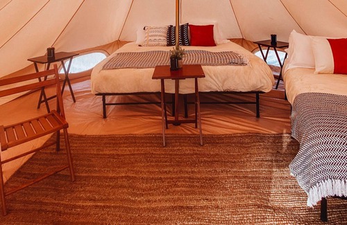 Tropic House | Triple Tent w/ Shared Bathroom - Beauty awaits you just past the red cliffs.