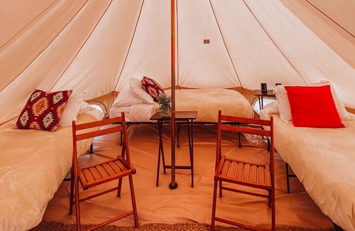 Tropic House | Triple Tent w/ Shared Bathroom - Beauty awaits you just past the red cliffs.