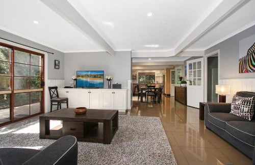 Bright House | Tudor House - Large Family Home with shared pool