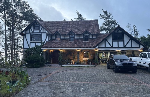 Cerro Azul House | Tudor Mountain Retreat