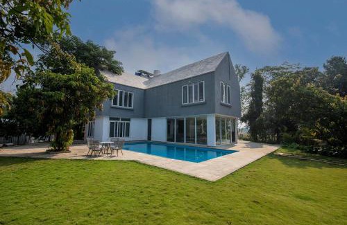 Khalapur Villa | Twilight Grove by StayVista - Pool- view villa with Manicured lawn, Contemporary interiors & Home theatre