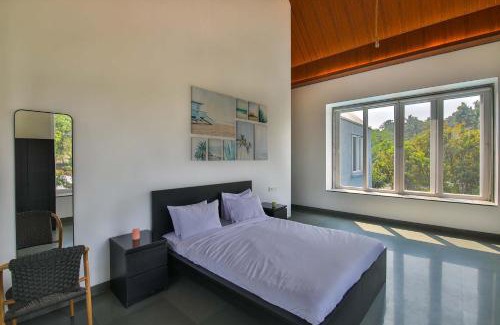 Khalapur Villa | Twilight Grove by StayVista - Pool- view villa with Manicured lawn, Contemporary interiors & Home theatre