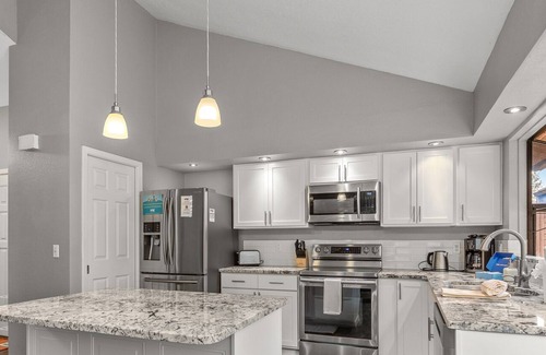 Rathdrum House | Twin Lakes Village Home—Golf Retreat, Community Pool, Corner Lot, and Single-Level Living!