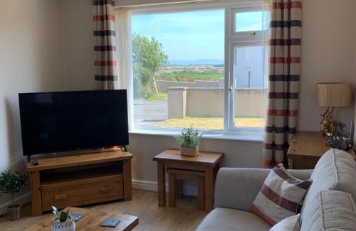 Caergeiliog House | Two bedroom house with enclosed gardens and 2 car drive