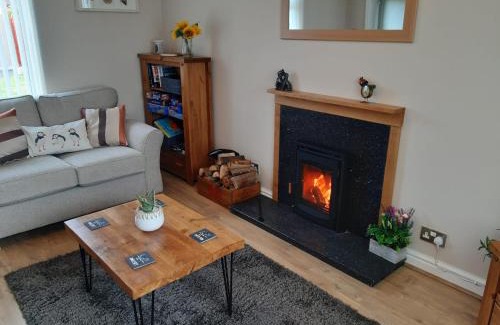 Caergeiliog House | Two bedroom house with enclosed gardens and 2 car drive
