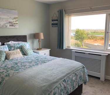 Caergeiliog House | Two bedroom house with enclosed gardens and 2 car drive