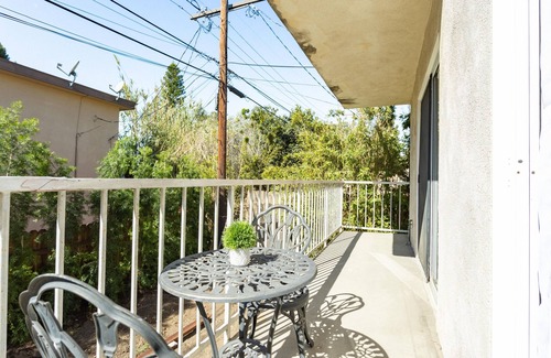 Palms Apartment | Two bedroom Townhome with huge private yard, patios, laundry, & garage parking!