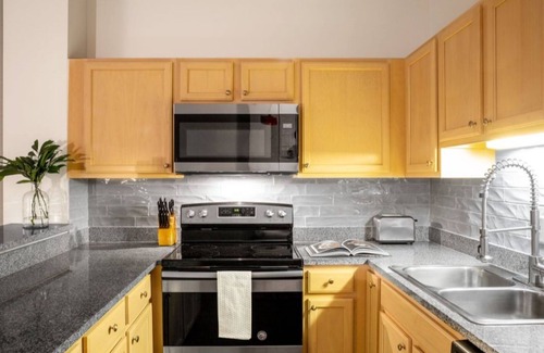 Wholesale District Apartment | TWO Bold 2BR 2BA Apartments by CozySuites