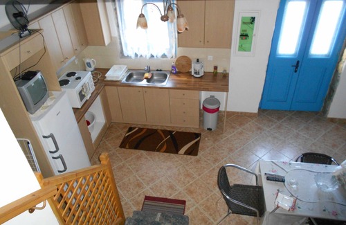 Astypalaia House | Two storey stone built house by the castle