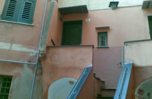 Camogli Apartment | Two windows of the fishing harbor