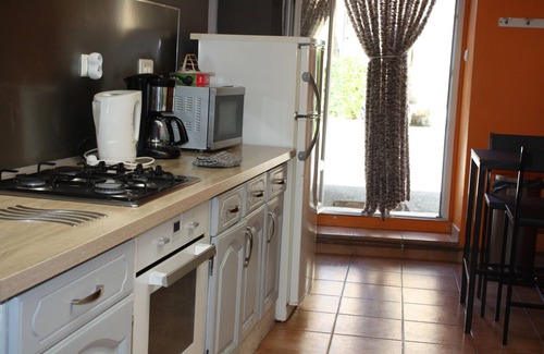 La Bruguiere House | Typical restored stone village house with cool, tranquil vaulted ceilings.
