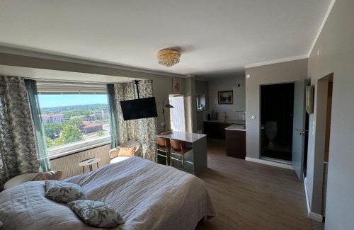 Lahti Apartment | Tyylikäs maisema-asunto asemalla