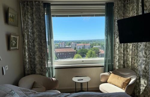 Lahti Apartment | Tyylikäs maisema-asunto asemalla