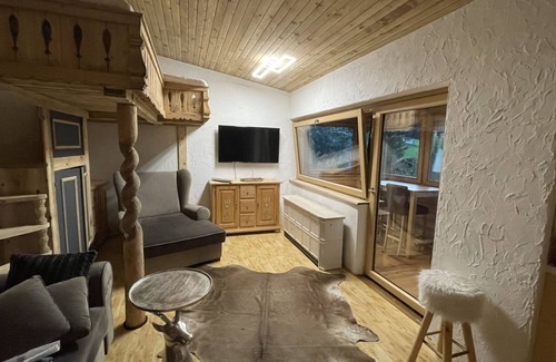 Kirchberg in Tirol Apartment | Unique living with conservatory and sleeping on the gallery