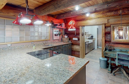 Carnation House | Unique mountain view log home with a wood stove, balcony, patio, & board games