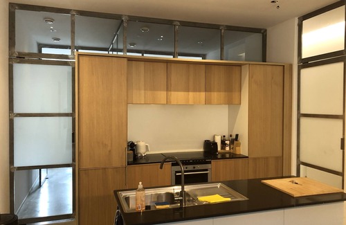 The Hague Center Condo | Unique open and bright apartment near the center, designed by the architect