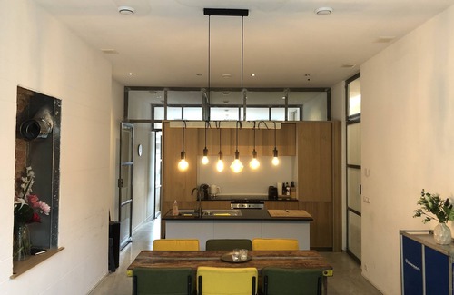 The Hague Center Condo | Unique open and bright apartment near the center, designed by the architect
