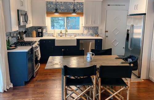 Mancelona Cottage | Updated Cabin with Fireplace, Epic Deck, 2 min from ORV trails - Pet Friendly!