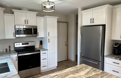 Harbor Springs Condo | Updated Phase 2 Hideaway Valley Condo Nestled in the Woods