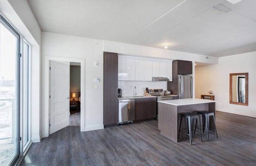Laval Apartment | Urban 2BR Escape In-suite Laundry and Terrace