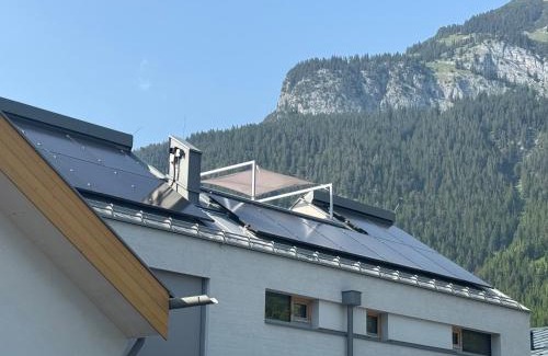 Maurach House | Urban Alpine Penthouse with Lake View