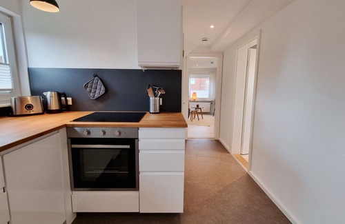 Kalifornien Apartment | Vacation apartment "Achtern Diek 3" 1st row on the Baltic Sea coast, dog-friendly