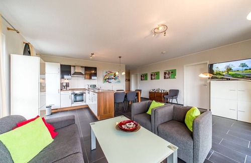 Schillig Apartment | Vacation apartment by the North Sea with a great balcony by the water and its own sauna