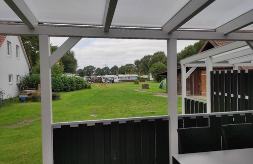 Zetel Apartment | Vacation apartment "Tammo" by the lake on the North Sea
