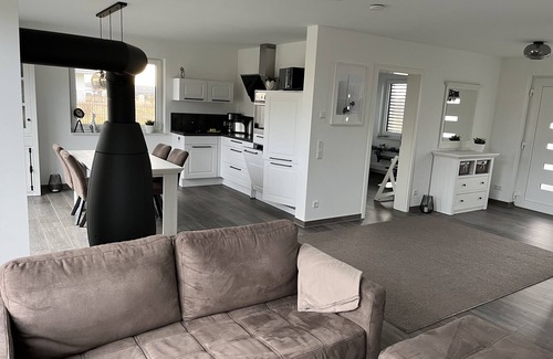 Lobnitz House | Vacation home Oskar on the lake with private beach for 4 adults, fireplace, boat and sauna