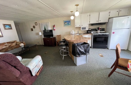 Herron House | Vacation Stay at Hubbard Lake Air-Conditioned Lakefront Mobile Home