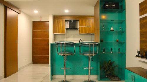 Palayam Apartment | Vantage Dew Palace by livNstay