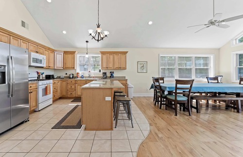 Kendall House | Vast Lakefront Home with Rec Room and Fire Pit
