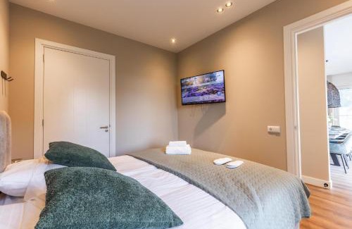 Wekerom Villa | Veluwe Villa met Binnenzwembad & Wellness - 12 personen