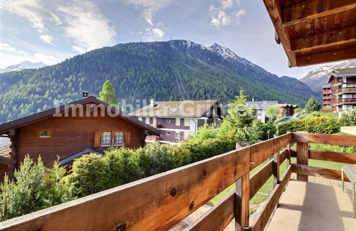 Grimentz Apartment | Very comfortable flat on 2 levels for 5 to 6 people, living room with wood-burner, kitchen area with