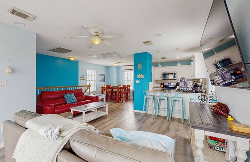 Galveston House | Vibrant dog friendly home with two balconies & outdoor bar - steps to sand