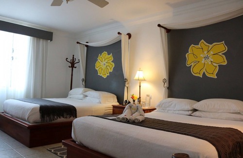 Belize City Bed & Breakfast | Villa Boscardi - 2 Queen Size Beds. Full Breakfast Included