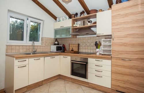 Omis Villa | Villa Eagle, isolated piece of your own paradise, heated pool, badminton court