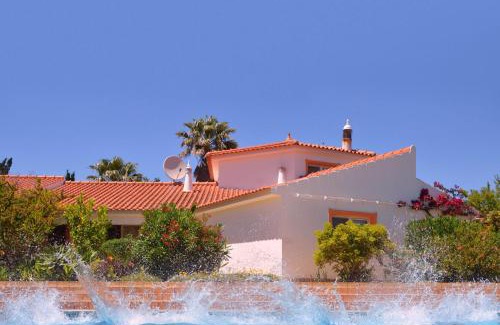 Funchal Villa | Villa Lagos Algarve for families & friends, 6 bedrooms, 7 bathrooms, pool, BBQ, central heating