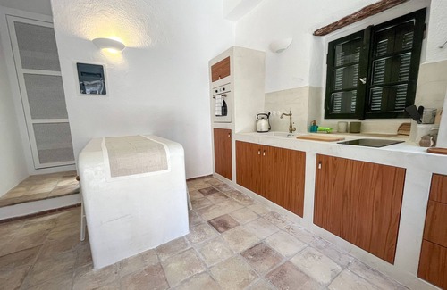 Korithi Villa | Villa set within private courtyard surrounded by mature olive trees
