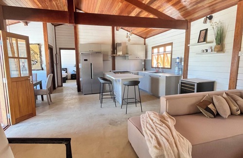 Mbodiene Ski Chalet | Villa Siga Fall ~ Elegant Wooden 2BR Retreat Near la Petite Côte.