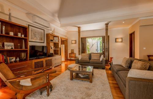 Tamarin Villa | Villa sur le golf avec piscine et jardin tropical