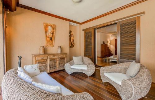 Tamarin Villa | Villa sur le golf avec piscine et jardin tropical