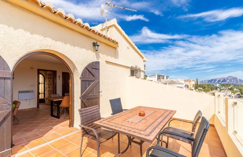 Benitachell Villa | Villa 'Vista Ibiza' with Sea Views, Private Pool, Garden, Balcony, Wi-Fi & A/C