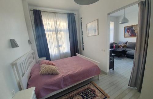 Business District Apartment | Vilnius apartment with stained glass