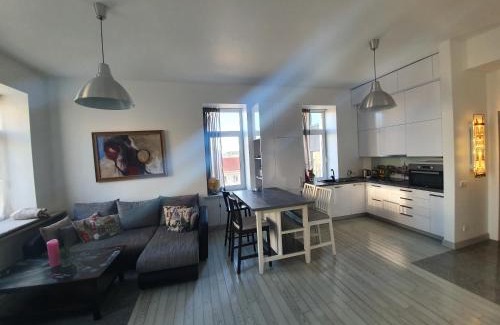 Business District Apartment | Vilnius apartment with stained glass
