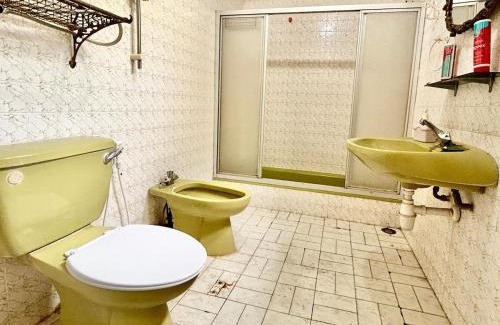 Petaling Jaya Apartment | Vintage Master bedroom with private toilet & bathtub